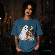 Topaz Blue unisex T-shirt featuring a smiling white ghost beside a mummy-wrapped puppy wearing a witch hat, with a crescent moon, stars, and orange autumn leaves.