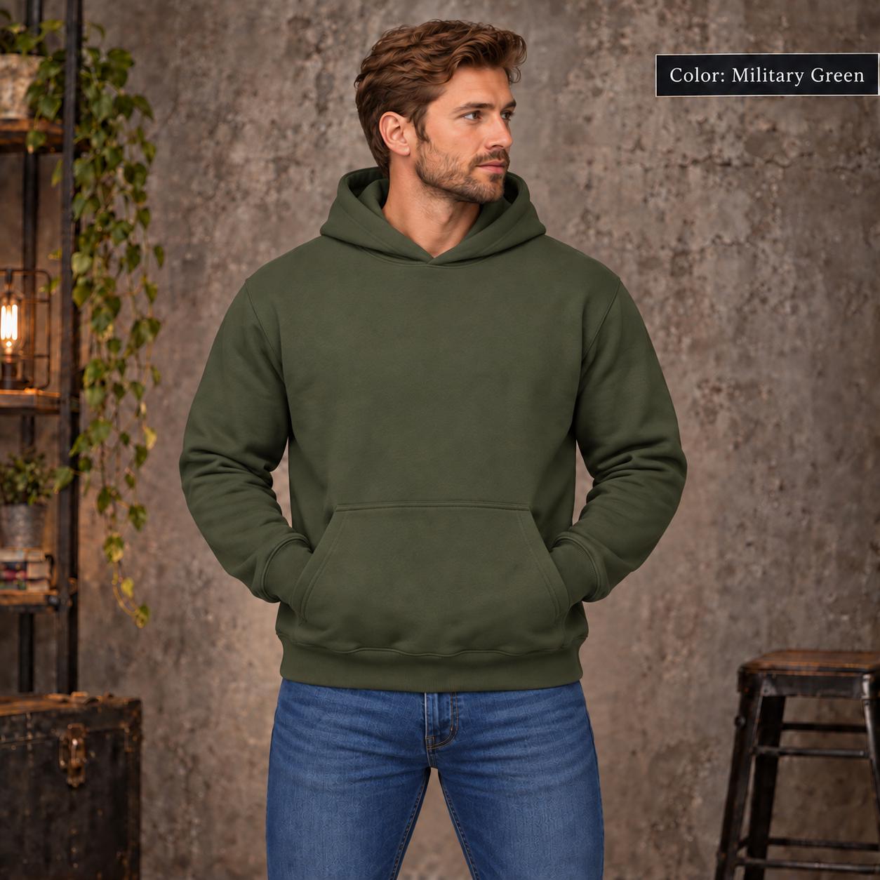 Military Green unisex hoodie shown from the front with a large Lost Compass Supply graphic featuring on the back a vintage compass, moonlit forest, directional markings, and the phrase “Direction Is Overrated.”