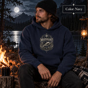 Navy unisex hoodie shown from the front with a smaller Midnight Naturalist Society bird skull emblem centered on the chest in a dark academia inspired style.