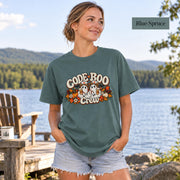Blue Spruce Comfort Colors shirt displaying the retro nurse ghost graphic with orange, cream, and black Halloween details.