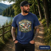 Heather Navy T-shirt featuring the rustic mallard design with lake, reeds, birds, and retro outdoor lettering.