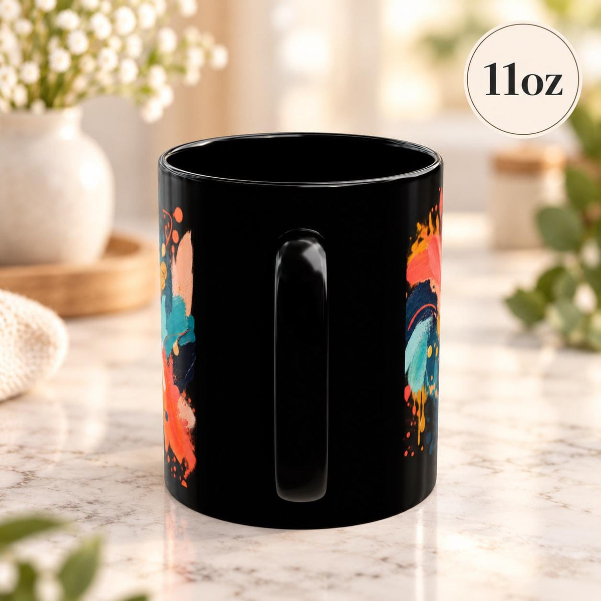 11 oz black mug shown from the back with the colorful wraparound artwork continuing across the glossy ceramic surface.