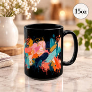 15 oz black mug featuring the same colorful composition with coral, teal, orange, cream, and pink brushwork.