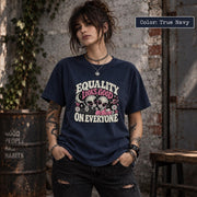 True Navy tee displaying the inclusive alien graphic with retro lettering, pink details, and a playful space-inspired layout.