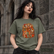 Heather Military Green shirt featuring the “Gobble Season” artwork with pumpkins, berries, wheat, and layered fall foliage.