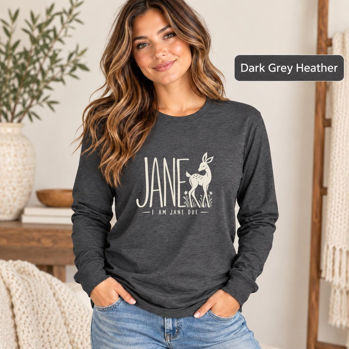 Dark Grey Heather long sleeve featuring the “I Am Jane Doe” message with minimalist typography and subtle botanical details.