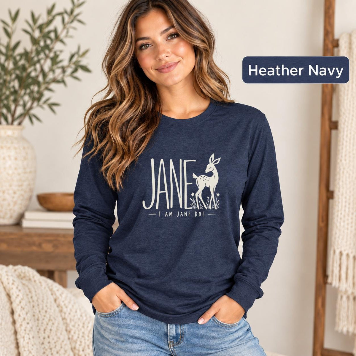 Heather Navy Bella+Canvas 3501 shirt displaying the “Jane — I Am Jane Doe” statement design in a soft unisex long sleeve style.
