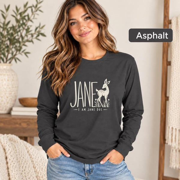 Asphalt Bella+Canvas 3501 long sleeve shirt featuring large cream “Jane” lettering, a minimalist doe illustration, and the phrase “I Am Jane Doe.”