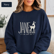Navy Gildan 18000 crewneck featuring the “I Am Jane Doe” statement artwork in cream on a dark blue background.