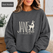 Dark Heather sweatshirt showcasing the minimalist Jane design with doe illustration and subtle botanical accents.