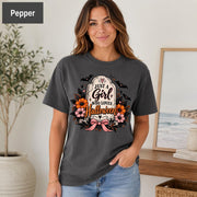Just a Girl Who Loves Halloween T-shirt in pepper featuring a floral tombstone design with bats, orange and pink flowers, hearts, sparkles, and a pink bow.