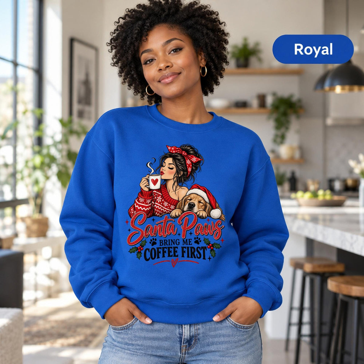Female model wearing a royal blue crewneck sweatshirt featuring the “Santa Paws Bring Me Coffee First” holiday dog lover graphic.