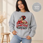 Female model wearing a sport grey crewneck sweatshirt with the “Santa Paws Bring Me Coffee First” Christmas coffee and dog artwork.
