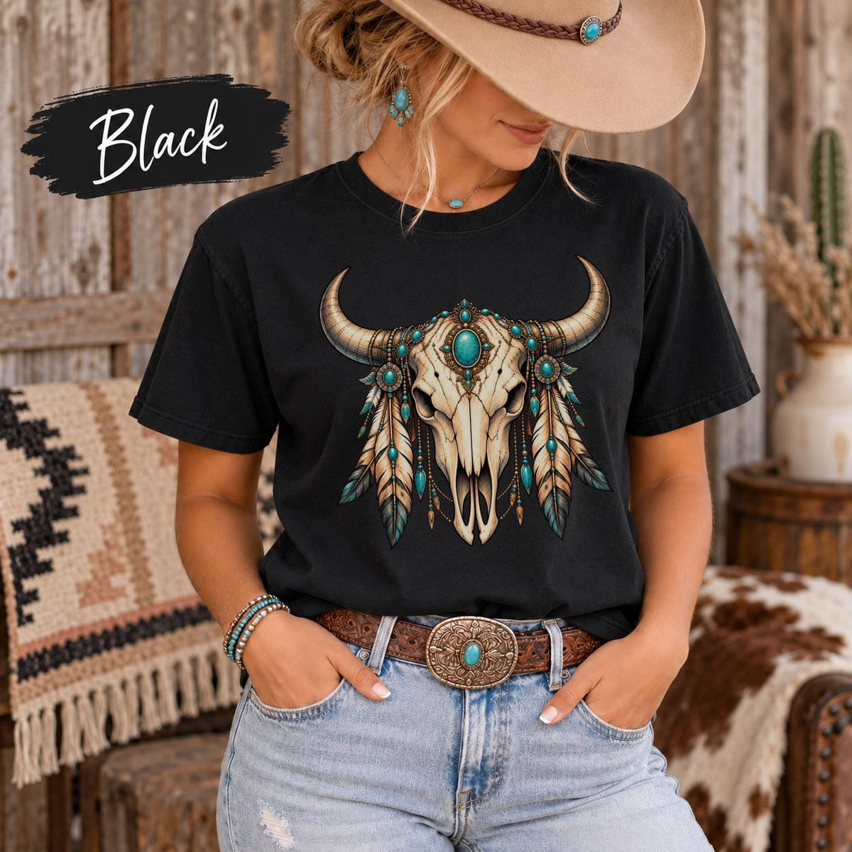 Black Comfort Colors shirt featuring the decorative bull skull design with turquoise jewelry accents and warm neutral tones.