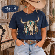 Midnight Comfort Colors 1717 shirt featuring the boho Western skull design with bright turquoise details and large curved horns.
