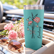 Teal 20oz tumbler featuring the same floral name design with contrasting black stems and soft pink blossoms.