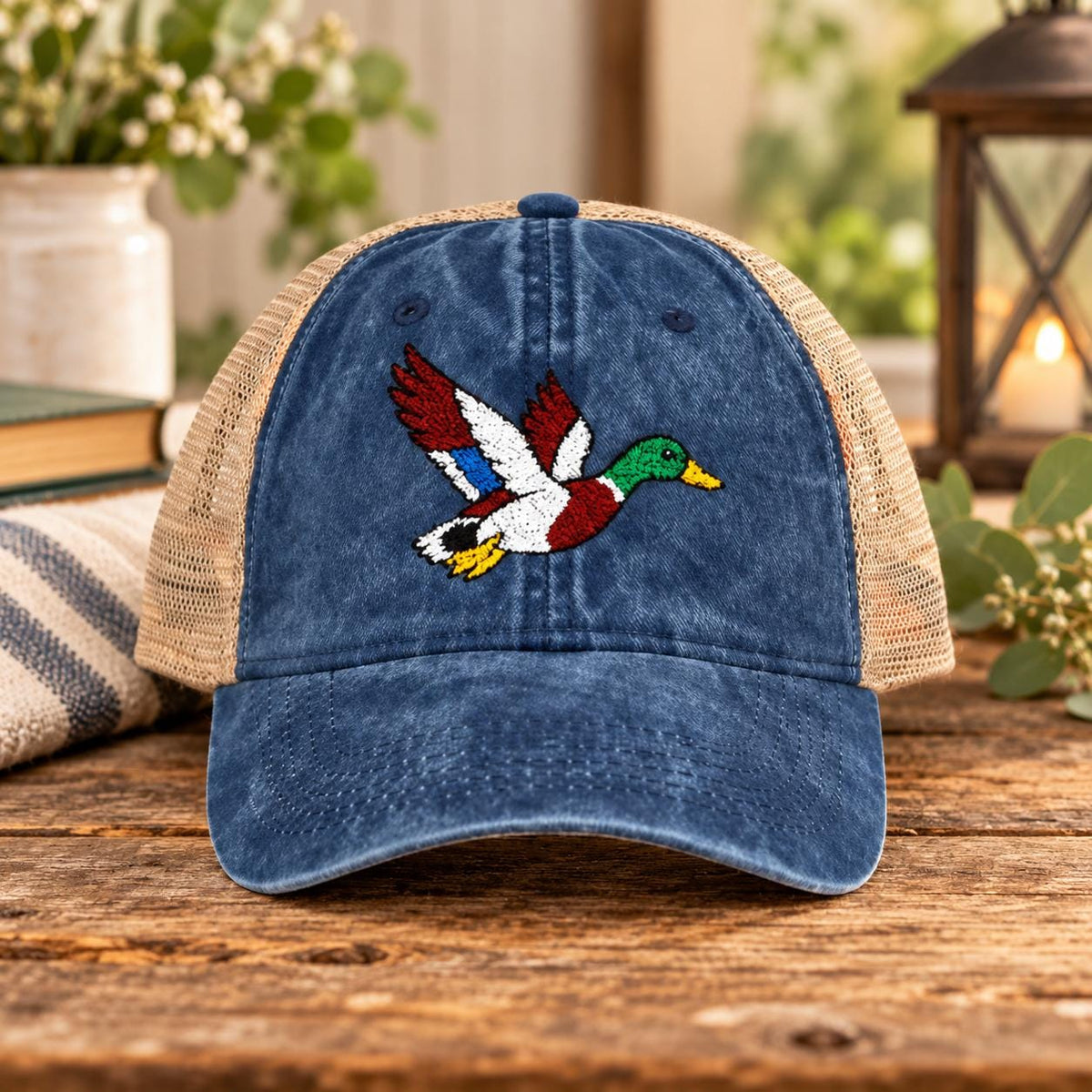 Navy women’s mesh-back hat featuring the flying mallard embroidery and casual outdoor look.