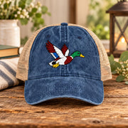 Navy women’s mesh-back hat featuring the flying mallard embroidery and casual outdoor look.