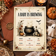Vintage A Baby Is Brewing Halloween baby shower invitation with gothic pumpkins, celestial accents and editable Canva event details.