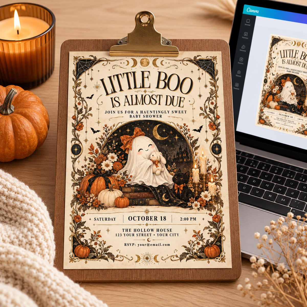 Editable Little Boo Is Almost Due Canva invitation shown beside a laptop with a clean autumn workspace.