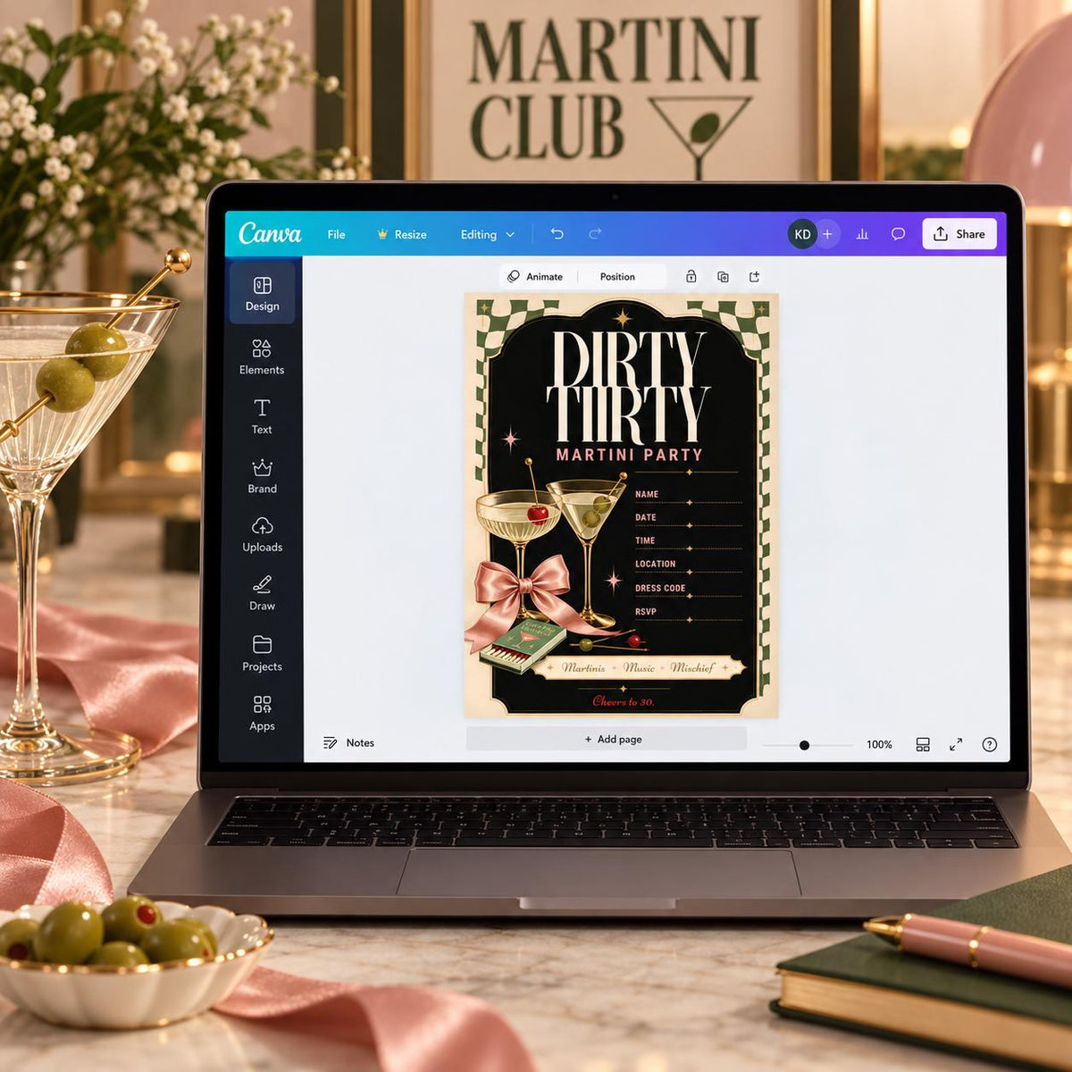 Dirty Thirty Martini Party editable invitation displayed in Canva on a laptop with chic cocktail-themed decor.