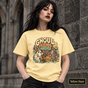Yellow Haze unisex T-shirt featuring a colorful “Ghoul Friends Forever” Halloween graphic with a ghost, black cat, pumpkin, witchy skeleton, bats, mushrooms, crescent moon, and autumn accents.