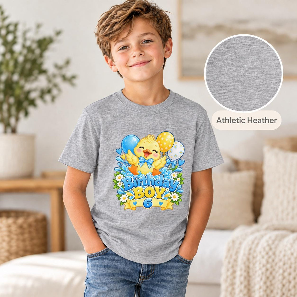 Athletic Heather youth T-shirt showcasing the personalized duck birthday artwork with bright blue, yellow, and white details.