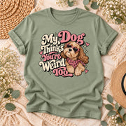 Sage green shirt featuring the retro My Dog Thinks You're Weird Too PNG design with a puppy in heart-shaped sunglasses and pink leopard-print bandana.