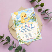 Editable boy birthday invitation featuring a cute yellow duckling, blue and yellow celebration artwork, and a pastel pink background with delicate floral accents.