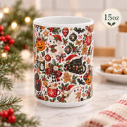 15 oz ceramic coffee cup displaying the full festive pattern with pumpkins, gingerbread cookies, winter greenery, bows, ornaments, and playful spooky accents.