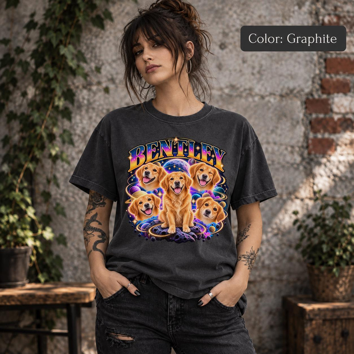Model wearing a dark graphite T-shirt displaying the personalized Bentley dog portrait with colorful galaxy graphics and distressed retro lettering.