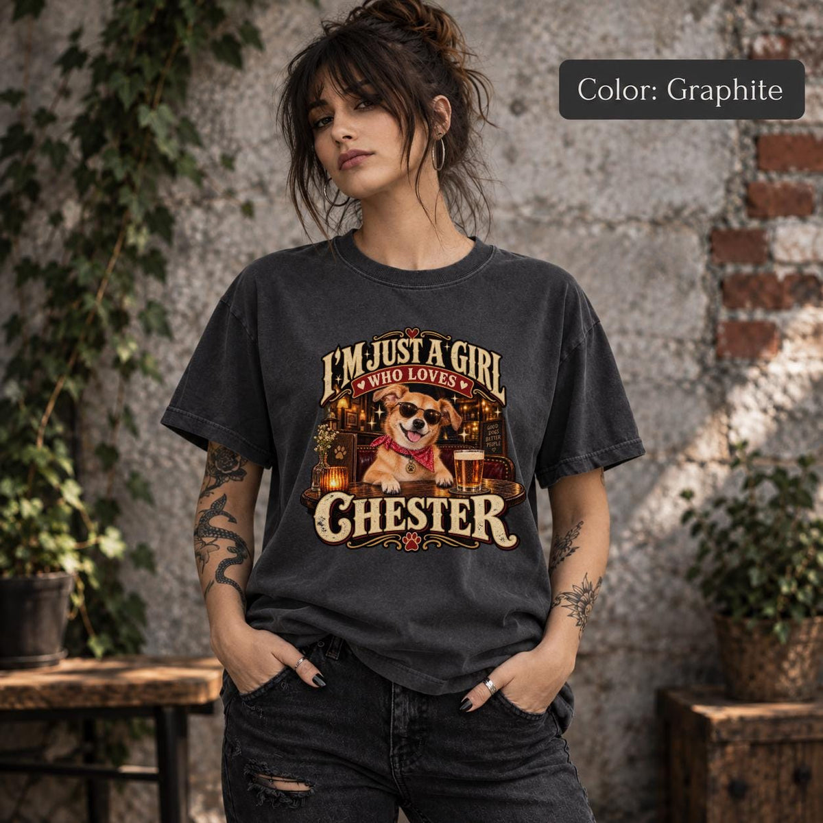 Model wearing a graphite graphic tee featuring a personalized Chester dog portrait, distressed typography, red bandana and rustic vintage pub illustration.