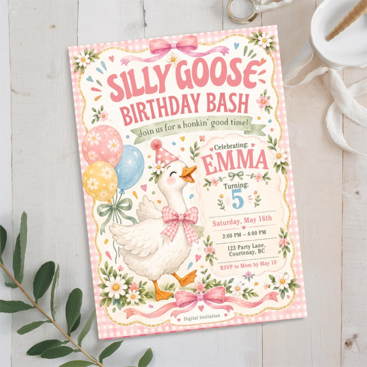 Silly Goose birthday invitation displayed upright in a soft floral setting, featuring a white goose wearing a pink party hat, pastel balloons and editable birthday party details.