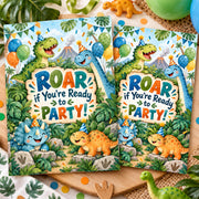 Matching front and back dinosaur birthday invitations displayed side by side with tropical party decorations, colorful dinosaur illustrations, balloons and a Roar If You're Ready to Party design.