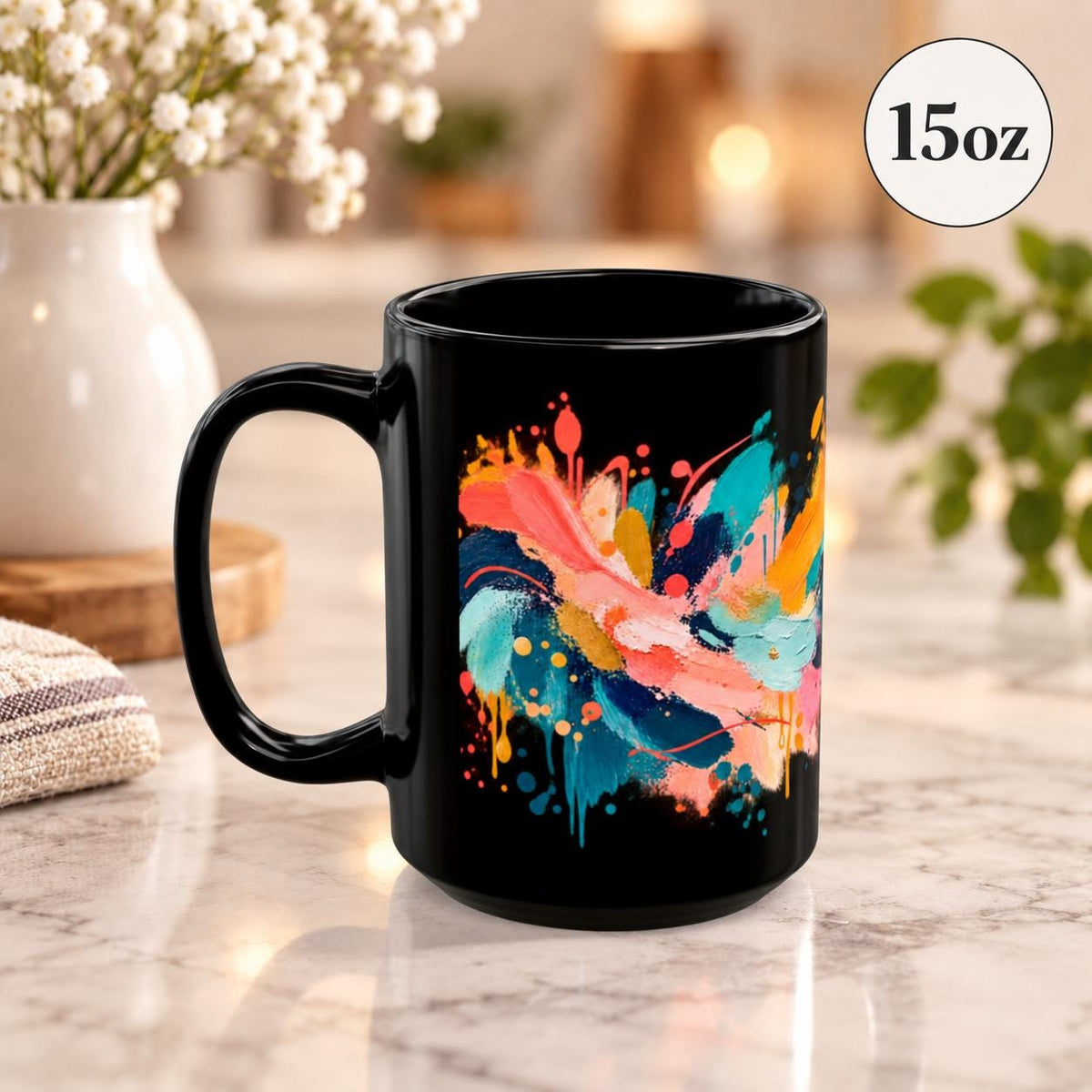 15 oz black coffee cup angled to showcase the full painterly pattern with bright brushstrokes and splattered accents.