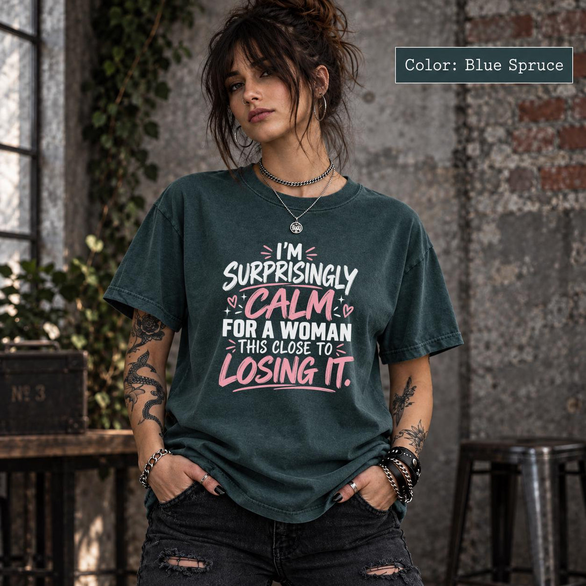 Blue Spruce Comfort Colors 1717 shirt featuring the “Surprisingly Calm” quote in a bold graphic layout.
