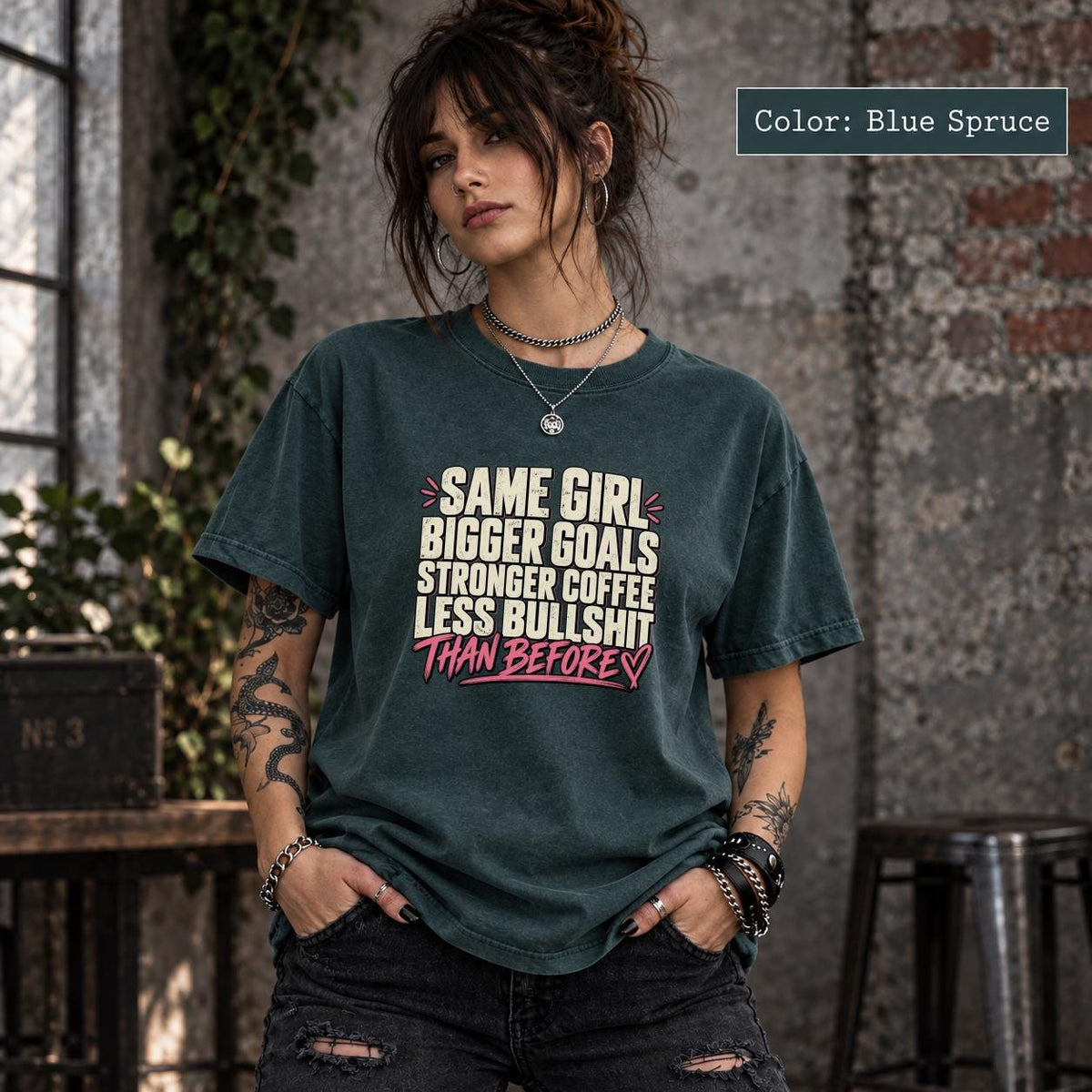 Blue Spruce Comfort Colors tee showcasing the ambitious women’s statement design in cream and pink tones.