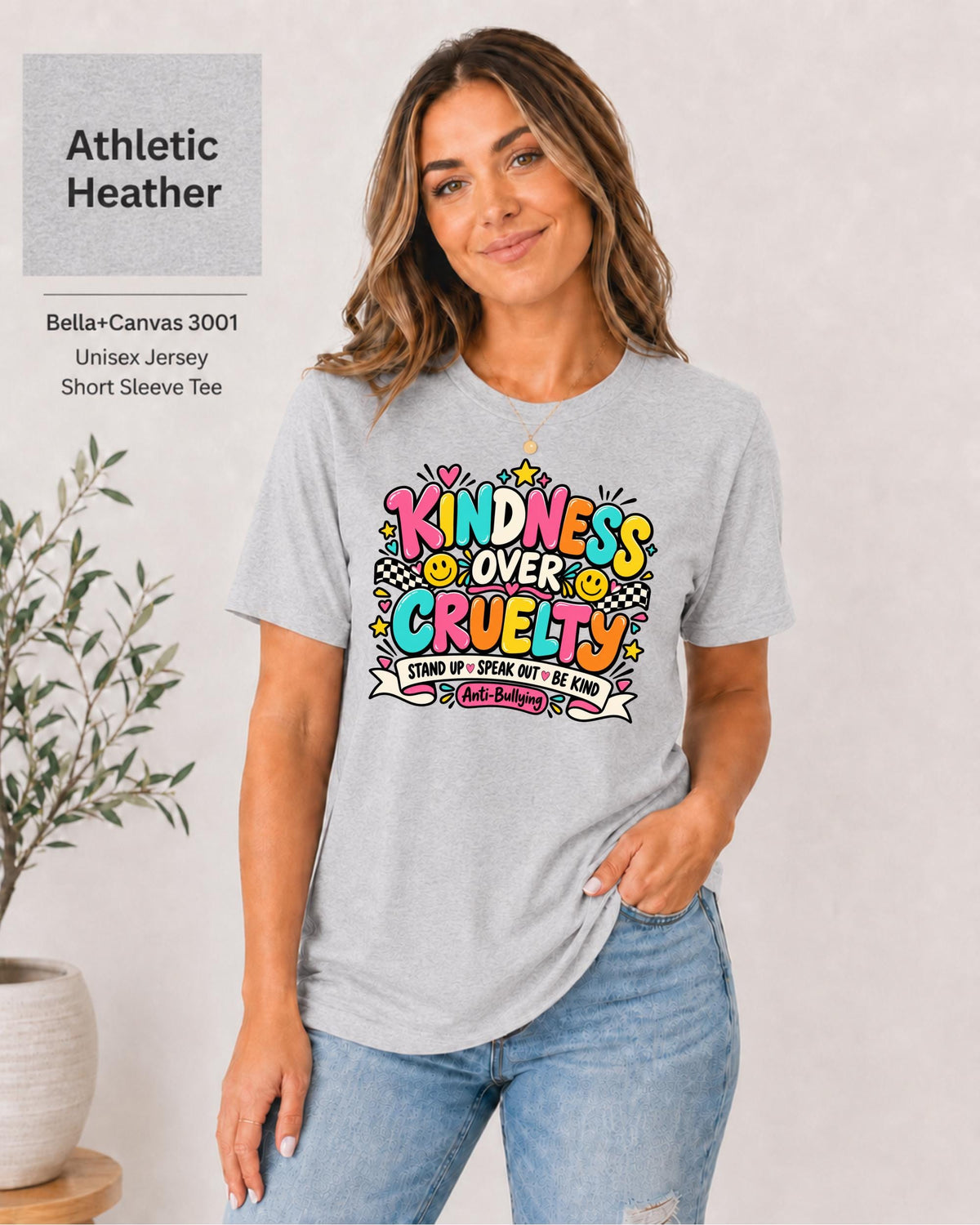 Athletic Heather Bella+Canvas 3001 shirt displaying the colorful kindness graphic with retro lettering and positive school message.