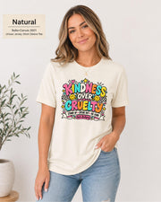 Natural unisex shirt displaying the kindness awareness graphic with retro colors, checkerboard elements, and supportive wording.