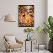Celestial fantasy poster displayed above a cream accent chair beside a floor lamp and greenery. Five women in flowing ivory gowns gather around a magical fire, with a moonlit castle and misty woodland in the background.