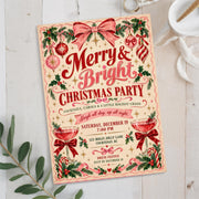 Christmas celebration invitation resting on light textured fabric with greenery and festive decorations. The editable 5x7 design features nostalgic holiday illustrations, red typography, and Christmas party details.