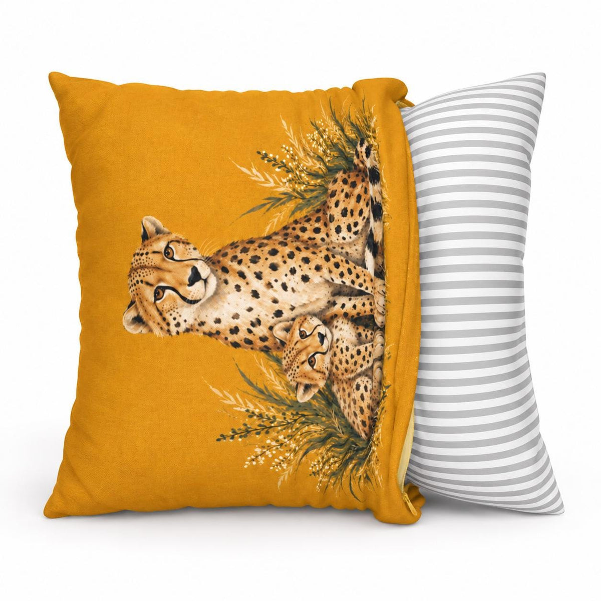 Side-view mockup of the mustard yellow cushion showing the printed cheetah design and striped backing fabric.