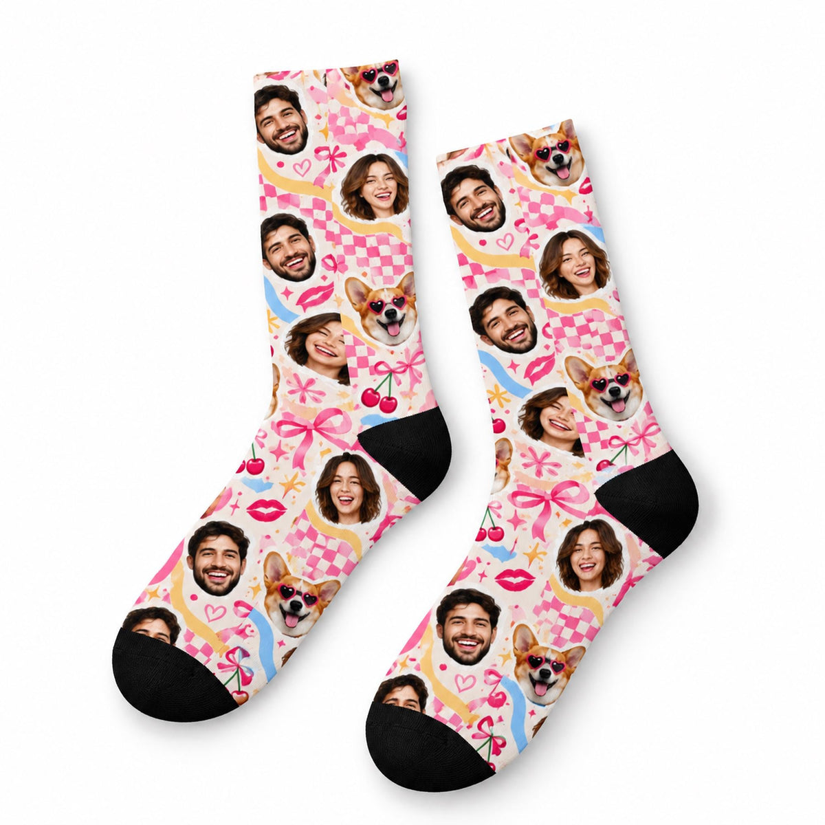 Pair of personalized photo socks displayed flat on a clean white background, showcasing the repeating face and pet photo design with pink checkerboard accents, retro decorations, and black reinforced-looking toes and heels.