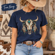 True Navy tee showcasing the Western skull artwork with horns, beads, feathers, and a vintage ranch aesthetic.