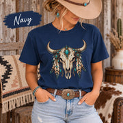 Navy tee showcasing the ornate Western skull graphic with feather details and turquoise-inspired stones.
