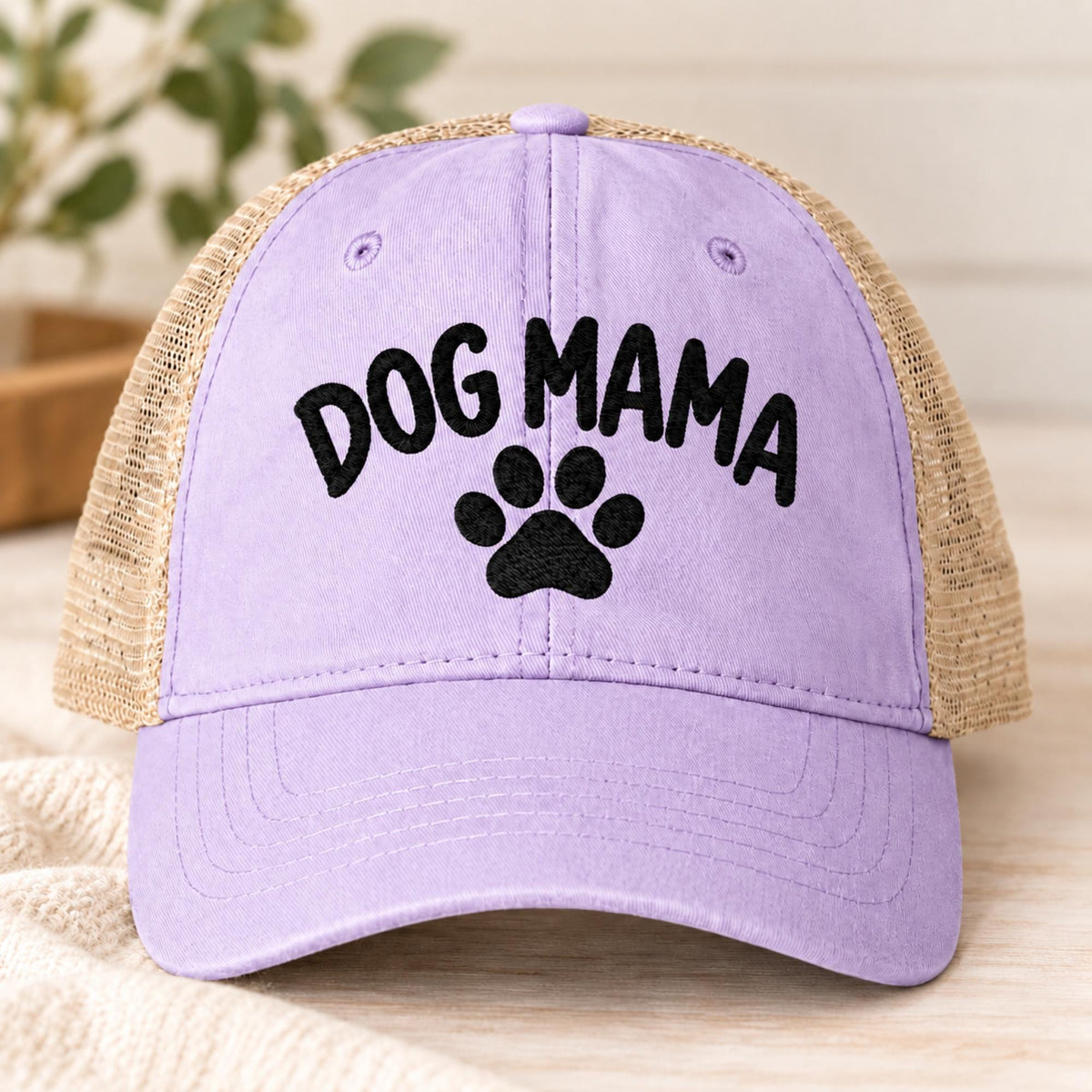 Lavender cap displaying the Dog Mama embroidery in black with a breathable tan mesh back and relaxed low-profile fit.