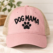 Dusty pink cap showcasing the black Dog Mama embroidery with paw print and casual washed finish.