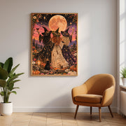 Colourful witchy wall art displayed above a mustard upholstered chair in a neutral interior. The Moonlight, Magic & Mischief poster features three witches raising their drinks beneath a luminous moon, with pumpkins, flowers, and a black cat.