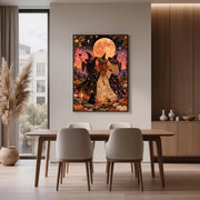 Colourful Gothic boho wall art displayed above a wooden dining table in a contemporary interior. The fantasy illustration features three witches standing together beneath a golden moon, surrounded by flowers and celestial details.