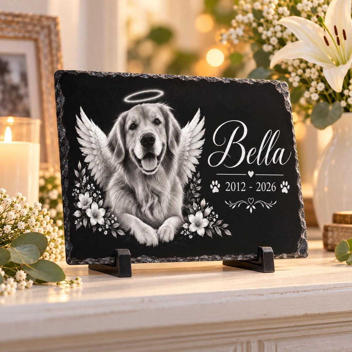 Landscape pet memorial plaque featuring a black-and-white dog portrait with halo, wings, floral details, custom name Bella, and remembrance dates.